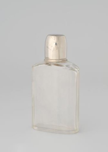 Glass flask with metal stopper and holder of brown leather