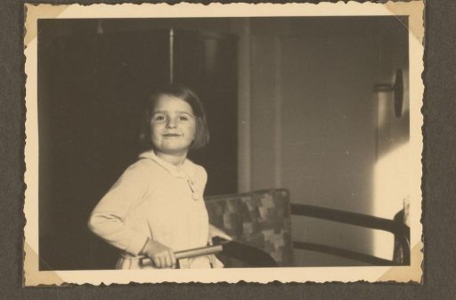 Isabel Wachenheimer beside a chair in the Wachenheimer family home