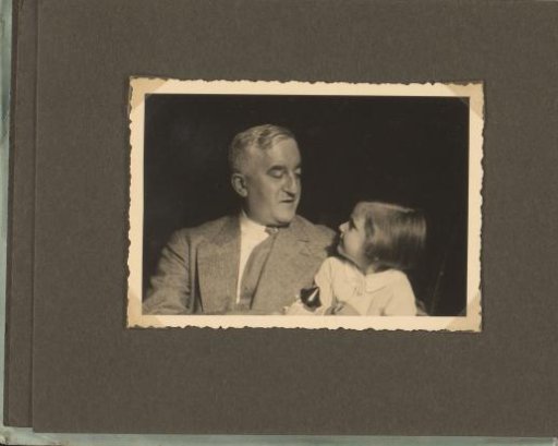 Isabel Wachenheimer looking at her father Eugen Wachenheimer and sitting on his lap