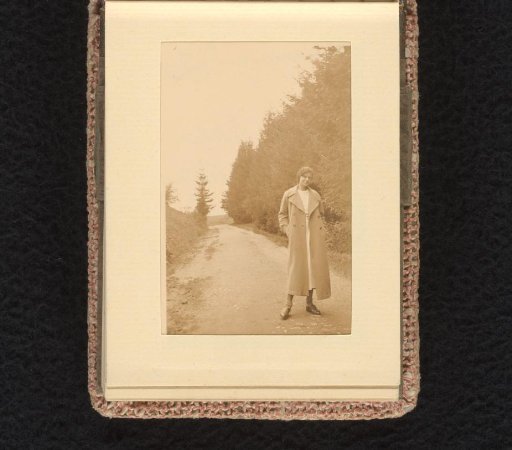 The nurse of the Wachenheimer family on a country road next to a forest, July–August 1933, Hamburg