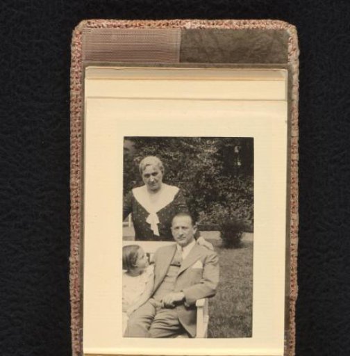 Isabel Wachenheimer sitting on a bench with her uncle Willy Moos and an unknown woman, July–August 1933, Hamburg