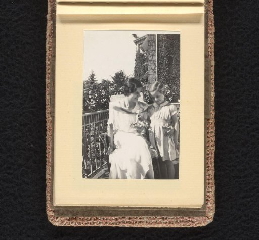 Isabel Wachenheimer on the balcony with her nurse, June-August 1933, Hamburg