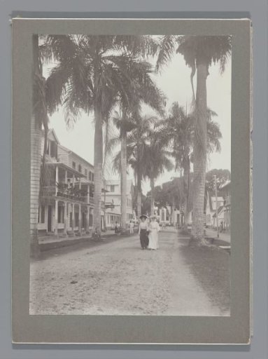 Female pedestrians in Paramaribo, Kerkstraat with the Reformed Church in the background