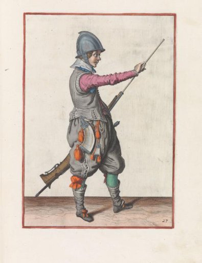Soldier pulling his ramrod from the barrel of his musket