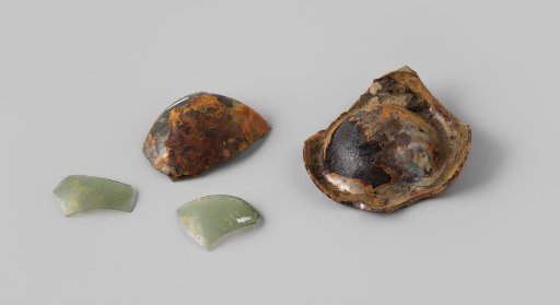 Fragments of Wine Bottles and Clear Glass from the Wreck of the East Indiaman 't Vliegend Hart