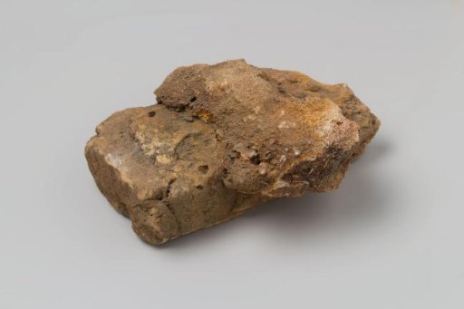 Part of a Brick with a Piece of Concretion from the Wreck of the East Indiaman 't Vliegend Hart