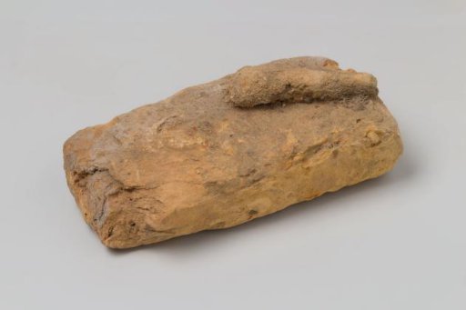 Brick with a Piece of Concretion from the Wreck of the East Indiaman 't Vliegend Hart