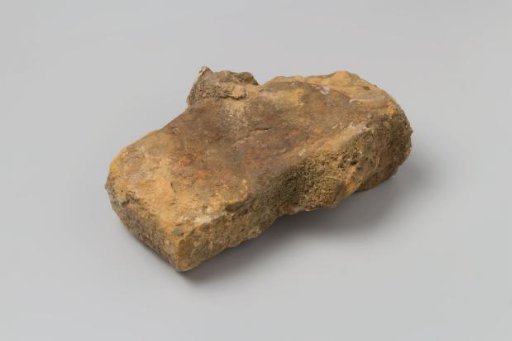 Part of a Brick with a Piece of Concretion from the Wreck of the East Indiaman 't Vliegend Hart