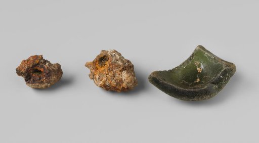 Glass shard and concretion from the wreck of the East Indiaman Hollandia