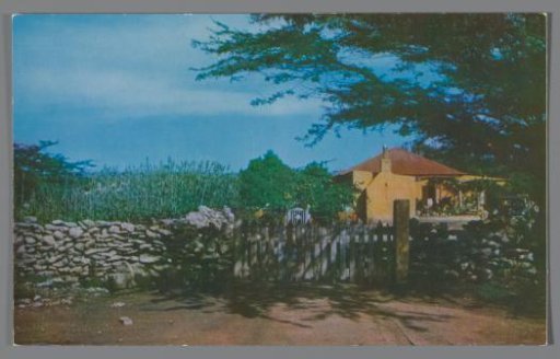 Typical Aruban cunucu (country) house with stone fence