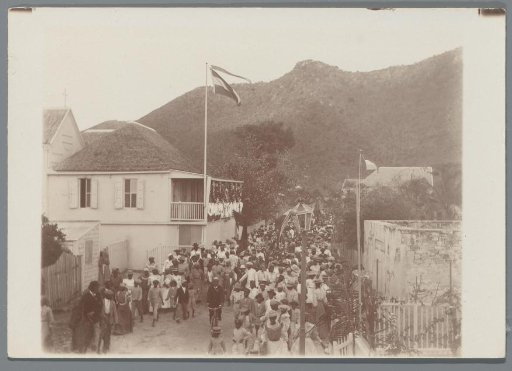 Second day: Parade of carriages. Mr. Armanie, Secretary of the festival committee, at the front on his bicycle