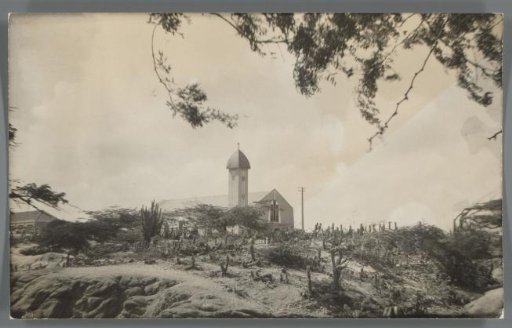 View of the Holy Mary Church in a landscape with cacti in Santa Cruz, Aruba