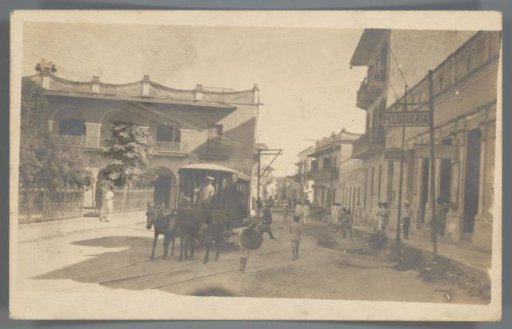 View of a Shopping Street with an Omnibus in Barranquilla