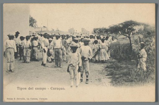 Large Group of Young People on and by an Unpaved Road in Curaçao