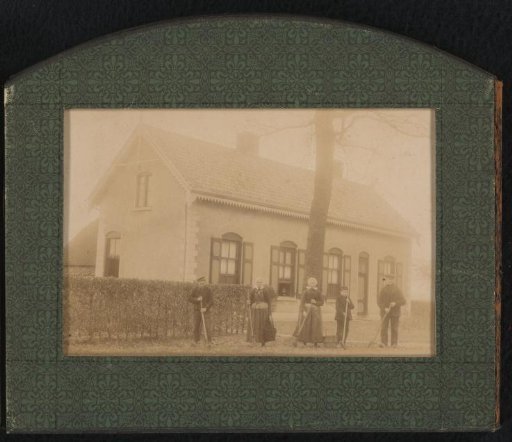 Five People in Front of a House