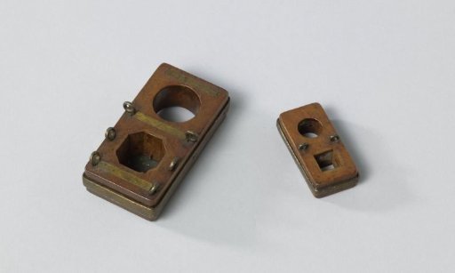 Two Models of Mast Caps