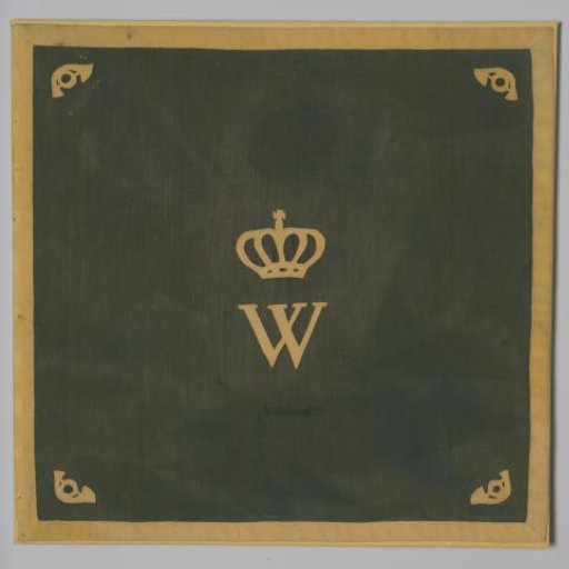 Green directional flag with a yellow crowned W