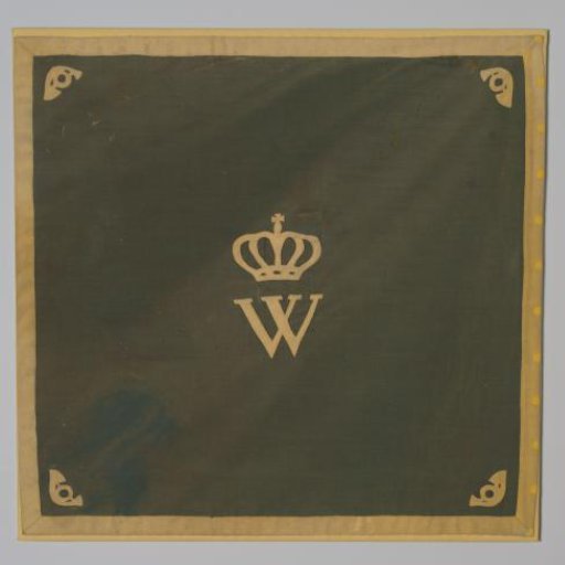 Green directional flag with a yellow crowned W