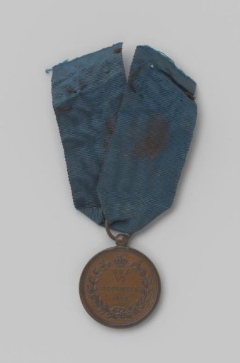 Citadel medal with wax seal on ribbon