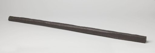 Long iron spoke with a round cross-section ending in a rectangular piece