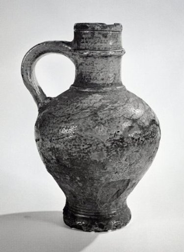 Earthenware jar containing some remaining fat