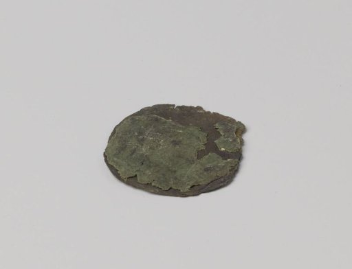 Lid of a brass powder measure with a leather case and leather earpieces