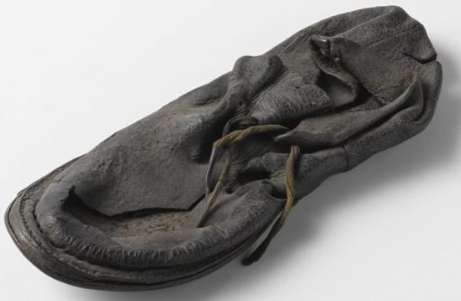 Left shoe, size 34, welted with a strap fastening
