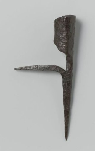 Candlestick consisting of a sleeve for a candle and two pins standing at right angles to each other