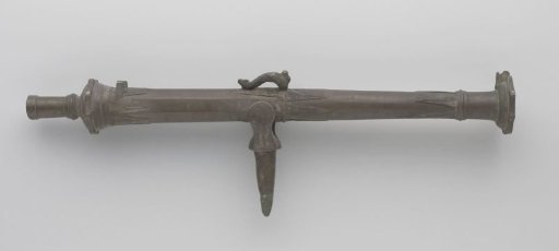 Bronze lily on a movable spindle