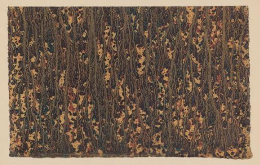 Marbled paper in black, red and blue on yellow-brown paper