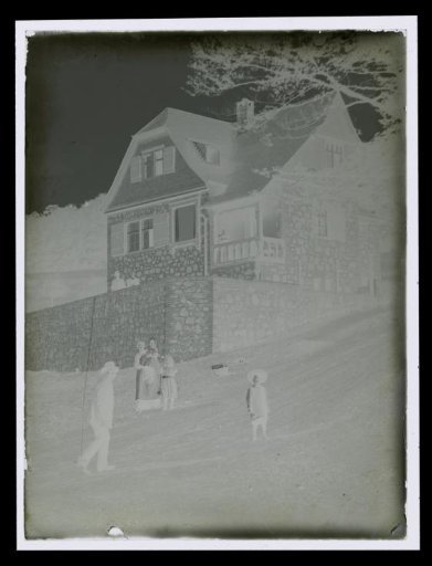 Family in front of a house