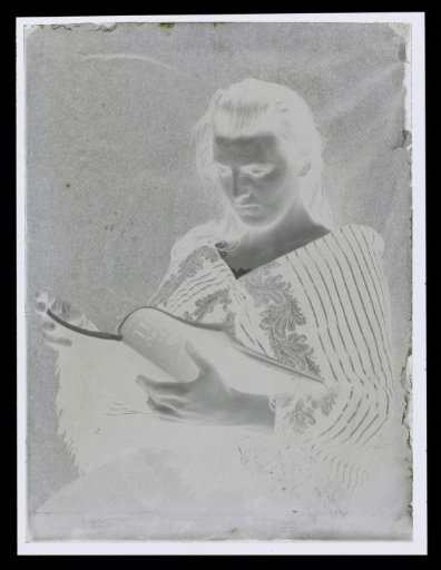 Portrait of an unknown reading woman