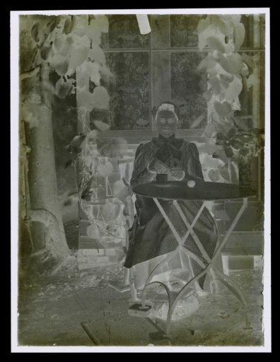 Portrait of an unknown girl drinking tea outdoors