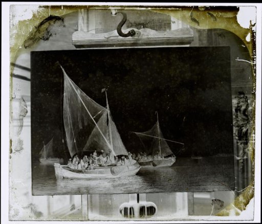 Photographic reproduction of a painting of sailing ships at sea