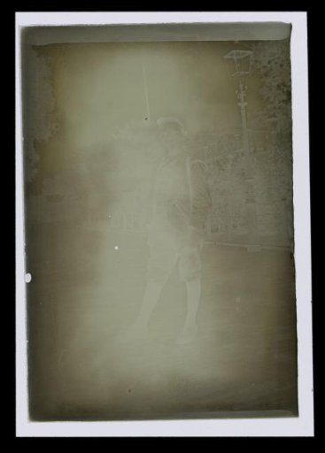 Portrait of an unknown man and woman, standing on the street