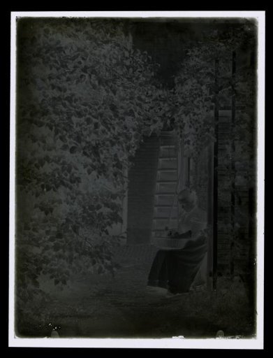 A. Baerselman Seated in a Garden with a Basket on Her Lap