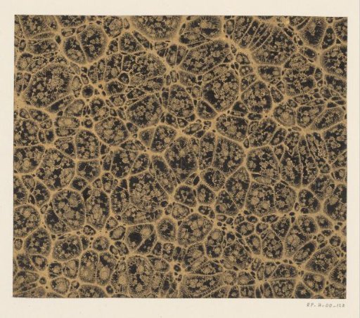 Krater marble in black, yellow and brown