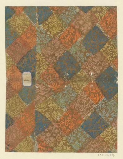 Sheet with scrolls of flowers and fruits, with label