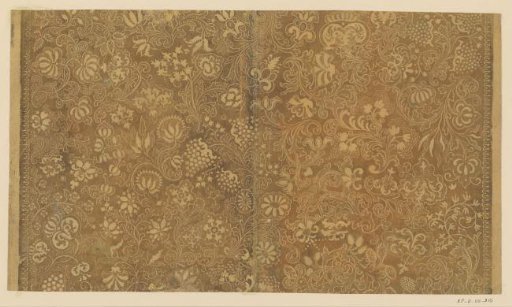 Sheet with scrolls with flowers and fruit and ornamental frame