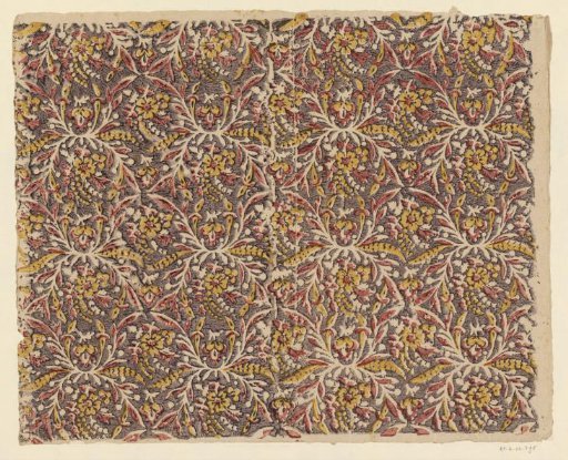 Sheet with cut-out vines with flowers and fruits