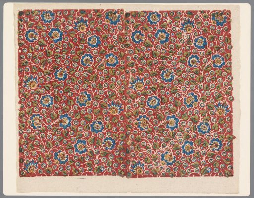 Sheet with a scattered pattern of cut-out flowers and fruits