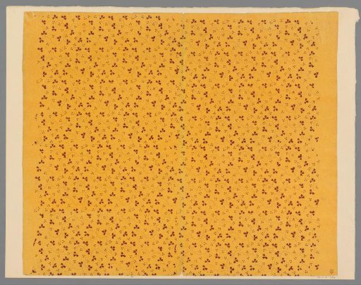 Sheet with scatter pattern of leaf motif connected with vines of dots