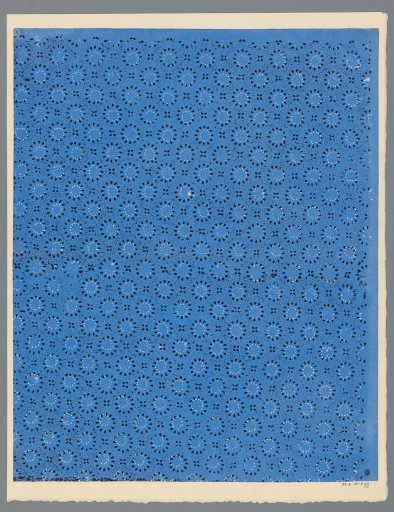 Sheet with scatter pattern of sun motif between dots