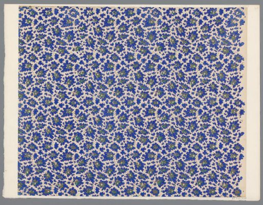 Sheet with scattered pattern of angular motifs