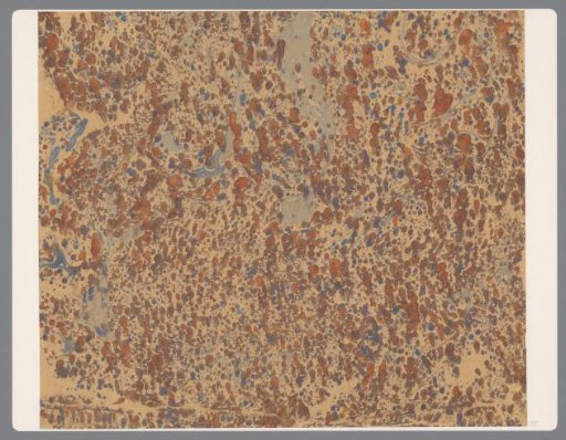 Pebble marble in brown and blue on yellow paper
