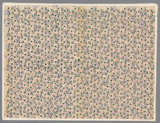 Sheet with a scattered pattern of round motifs on a stippled ground