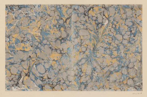 Spiral marble in blue, yellow, black and grey with gold on the cut