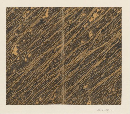 Veined marble in black on yellow paper