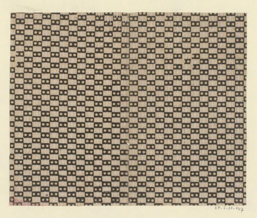 Sheet with checkerboard pattern of blocks with dots and stripes