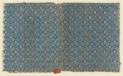 Sheet with diamond pattern with reserved twig and diagonal reserved dot